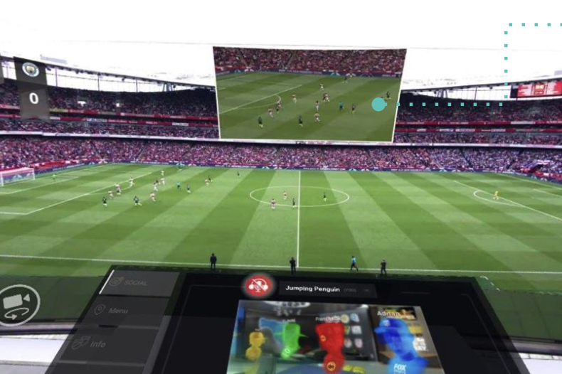 A panoramic view of a football stadium in VR with a large screen showing a match.